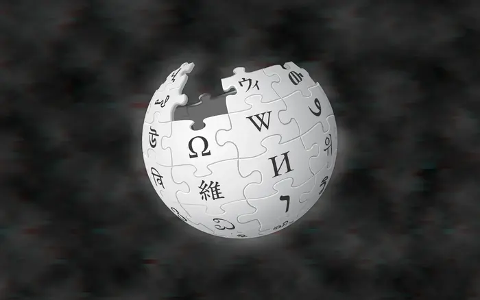 The Wikipedia puzzle globe logo on a dark glitchy background