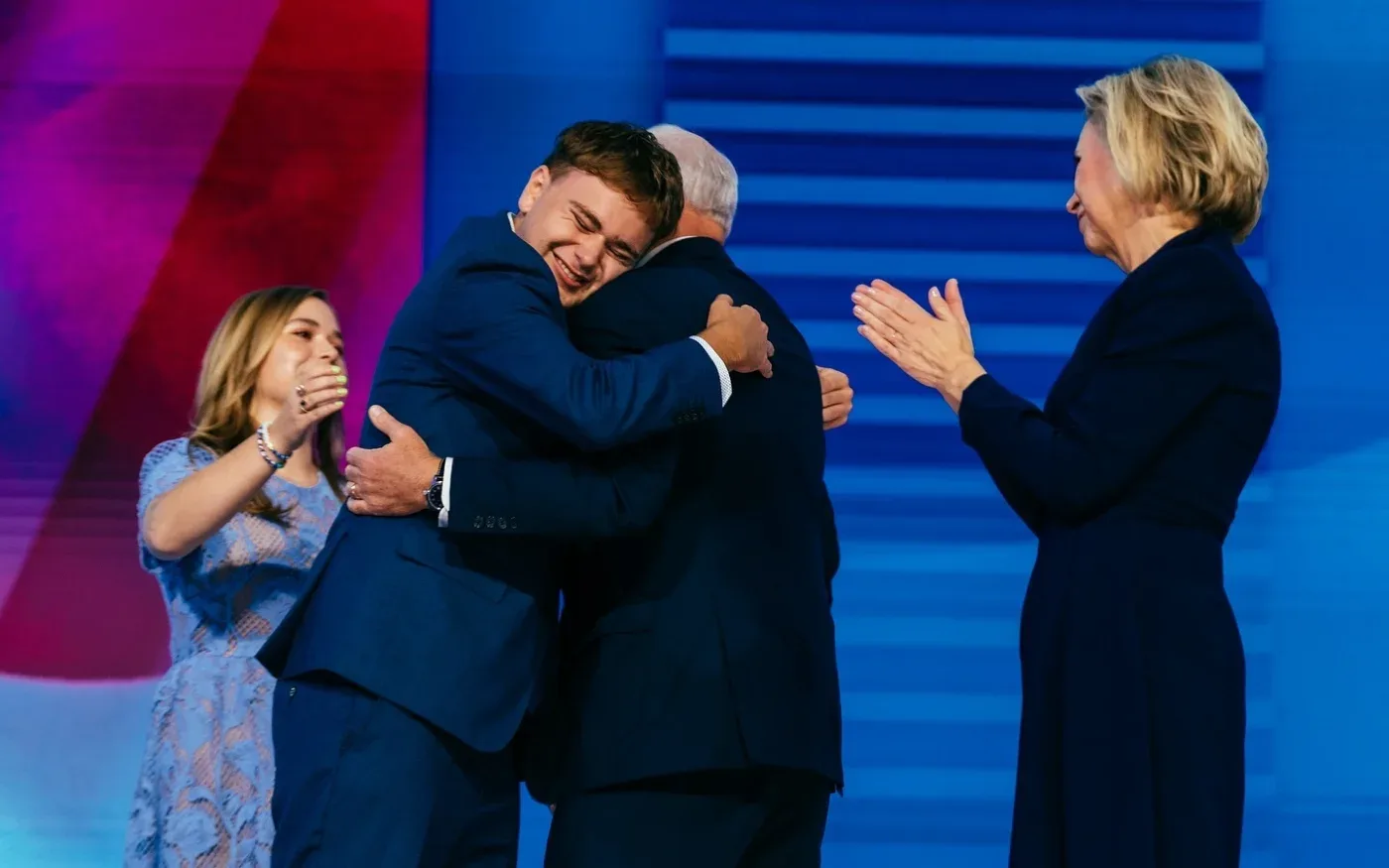 Gus and Tim Walz embrace at the 2024 Democratic National Convention