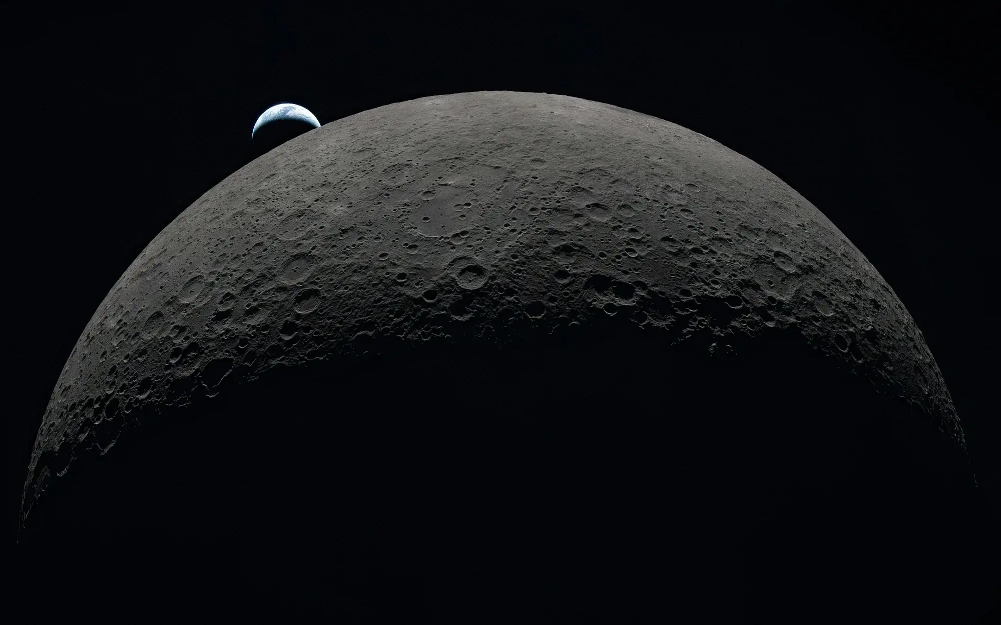 A photo of the Moon with Earth lurking in the distance